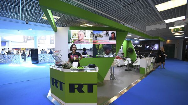 RT stand at an expo in Cannes, France. File photo. - Sputnik भारत
