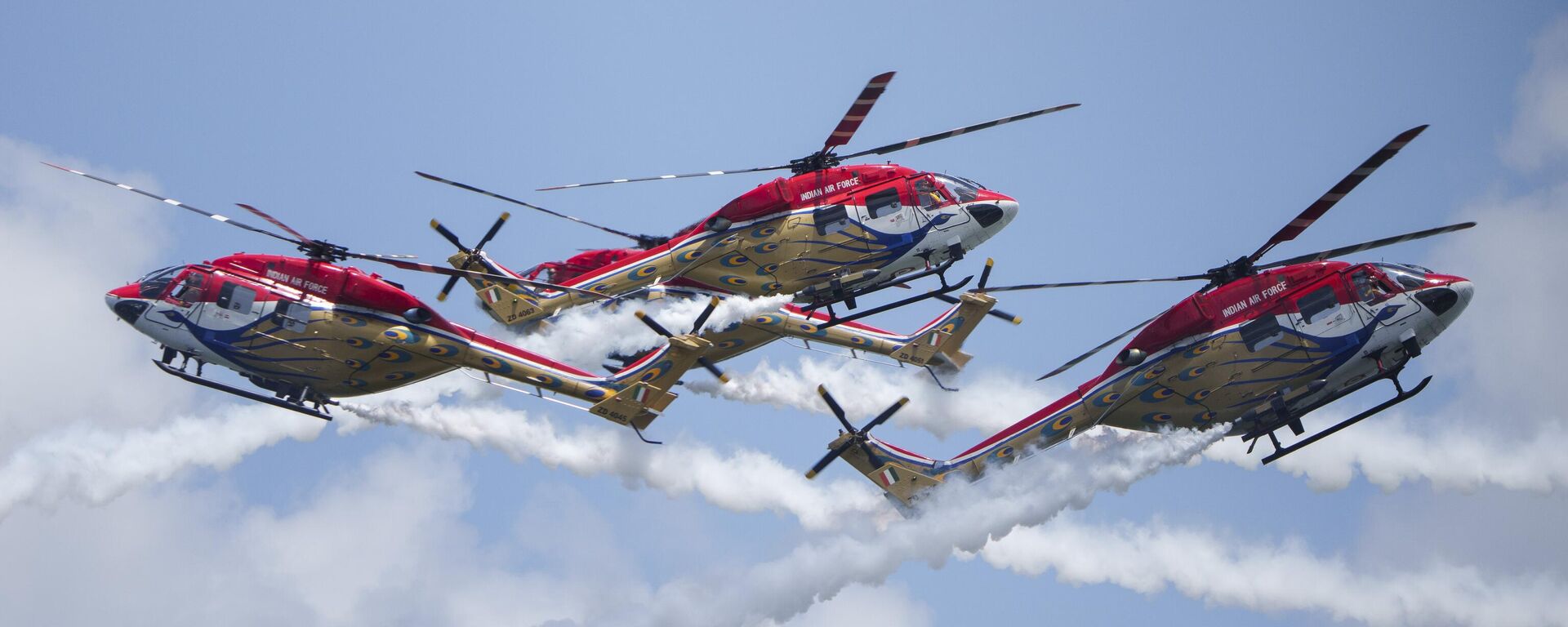 The Sarang Helicopter Display Team of the Indian Air Force (IAF) fly modified HAL Dhruv helicopters, also known as Advanced Light Helicopter (ALH), during the Singapore Airshow - Sputnik India, 1920, 24.05.2024