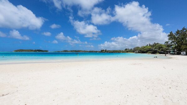 This September 25, 2021 picture shows the deserted beach of Blue Bay in south-east Mauritius. - Sputnik India