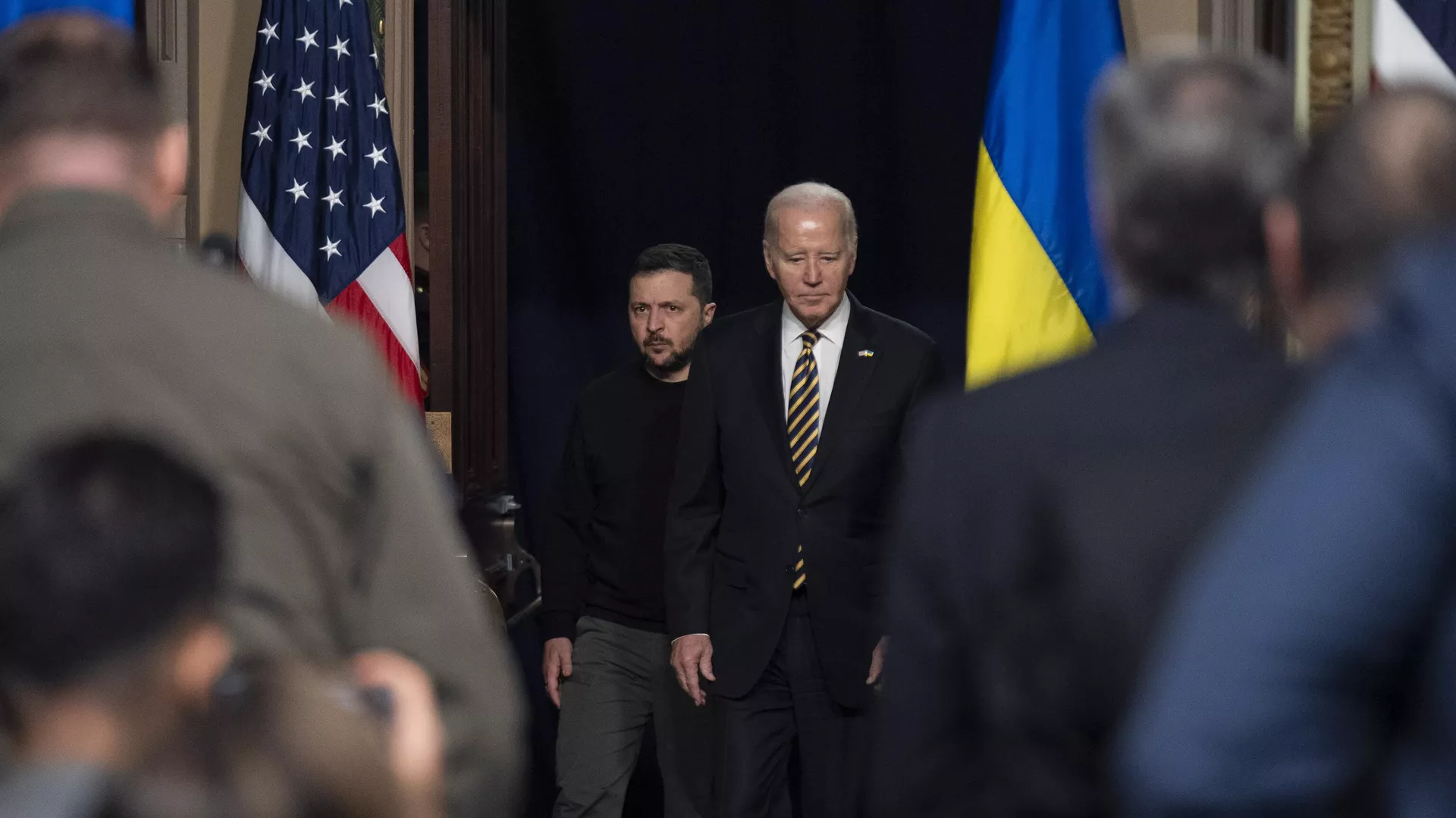 President Joe Biden and Ukrainian President Volodymyr Zelenskyy arrives at a news conference in the Indian Treaty Room in the Eisenhower Executive Office Building on the White House Campus, Tuesday, Dec. 12, 2023, in Washington.