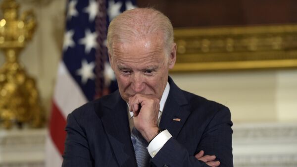 Vice President Joe Biden listens during a ceremony in the State Dining Room of the White House in Washington, Thursday, Jan. 12, 2017, where President Barack Obama presented him with the Presidential Medal of Freedom - Sputnik India