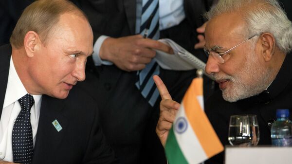 Russia's President Vladimir Putin, left, and India's Prime Minister Narendra Modi chat during the BRICS Summit at the Itamaraty Palace, in Brasilia, Brazil, Wednesday, July 16, 2014 - Sputnik भारत