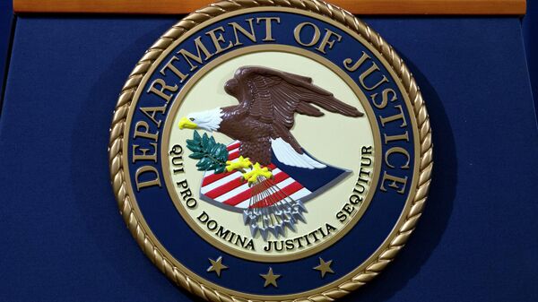 FILE - In this Nov. 28, 2018, file photo, the Department of Justice seal is seen in Washington, D.C. The Justice Department has released a new regulation spelling out detailed nationwide requirements for sex offender registration under a law Congress passed in 2006. The regulation released Monday stems from the Sex Offender Registration and Notification Act. It requires convicted sex offenders to register in the states in which they live, work or attend school.  (AP Photo/Jose Luis Magana, File) - Sputnik India