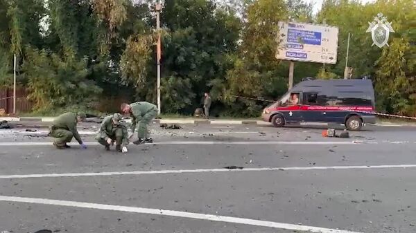 Investigators working at the scene of the car accident that killed Russian journalist and political analyst Daria Dugina. Moscow region, August 21, 2022 - Sputnik भारत