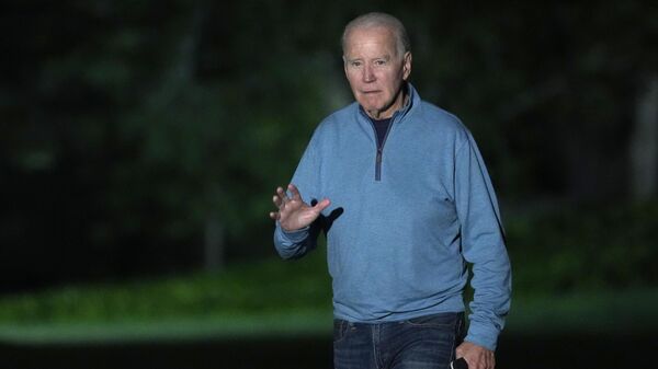 President Joe Biden walks across the South Lawn of the White House in Washington, Tuesday, Sept. 12, 2023, after returning from a trip to India and Vietnam. - Sputnik India