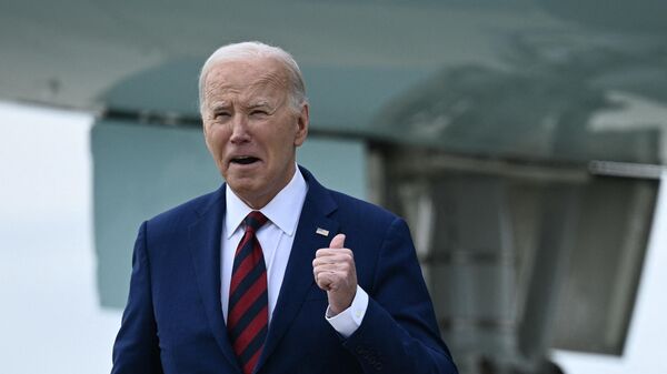 US President Joe Biden arrives at Raleigh-Durham International Airport in Raleigh, North Carolina, on March 26, 2024.  - Sputnik India