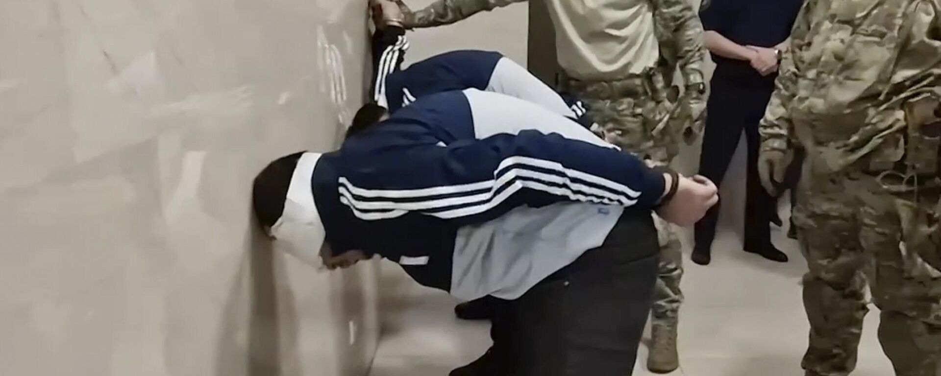 In this photo taken from video released by Investigative Committee of Russia on Sunday, March 24, 2024, suspects in the Crocus City Hall shooting on Friday, stand inside the Russian Investigative Committee headquarters in Moscow, Russia.  - Sputnik भारत, 1920, 05.04.2024
