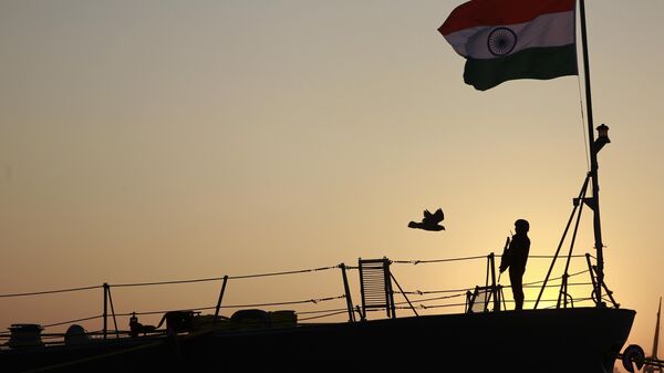 Indian navy person stands guard on board war ship Godavari during its decommissioning at the naval dockyard in Mumbai, India, Wednesday, Dec. 23, 2015.  - Sputnik भारत