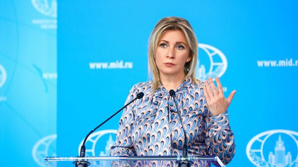 In this handout photo released by the Russian Foreign Ministry, Russian Foreign Ministry’s spokeswoman Maria Zakharova attends her weekly briefing in Moscow, Russia - Sputnik India