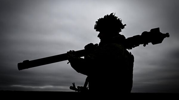 A Russian soldier from the crew of the Igla man-portable anti-aircraft missile system (MANPADS) in the zone of the special military operation. - Sputnik भारत