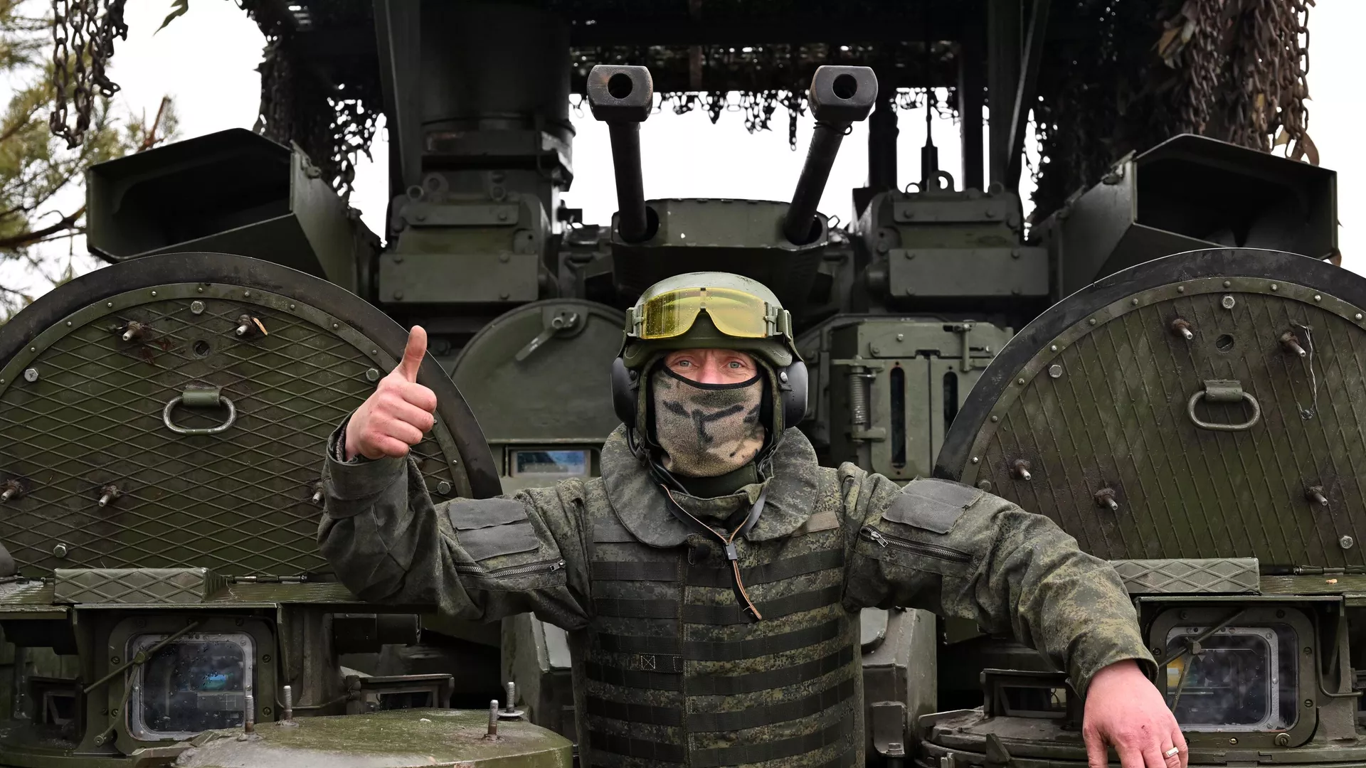 A serviceman of Russian Central Military District gives a thumbs-up