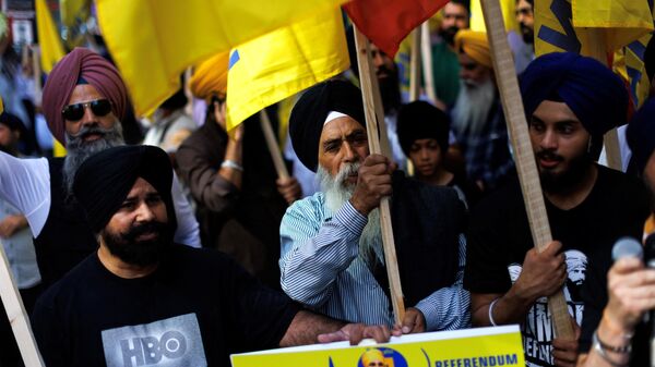 Demonstrators rally in support of Khalistan, an advocated independent Sikh homeland, in Toronto on September 25, 2023, following the murder of Sikh separatist Hardeep Singh Nijjar. - Sputnik भारत