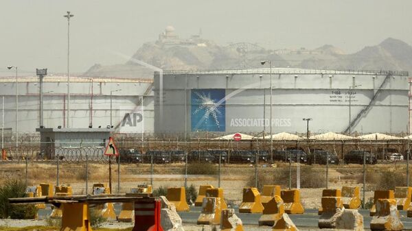 FILE - Storage tanks are seen at the North Jeddah bulk plant, an Aramco oil facility, in Jeddah, Saudi Arabia, on March 21, 2021. Saudi Arabia said Friday, May 31, 2024, it will sell a second sliver of stock in its state oil giant Aramco worth billions of dollars, its first tranche since its initial public offering back in 2019. (AP Photo/Amr Nabil, File) - Sputnik India