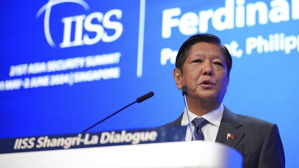 Philippine President Ferdinand Marcos Jr. delivers his opening speech for the 21st Shangri-La Dialogue summit at the Shangri-La Hotel in Singapore Friday, May 31, 2024. - Sputnik भारत