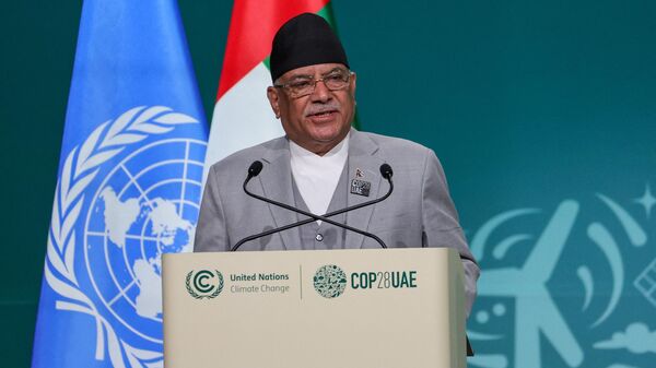 Nepal's Prime Minister Pushpa Kamal Dahal speaks during the High-Level Segment for Heads of State and Government session at the United Nations climate summit in Dubai on December 2, 2023. - Sputnik भारत