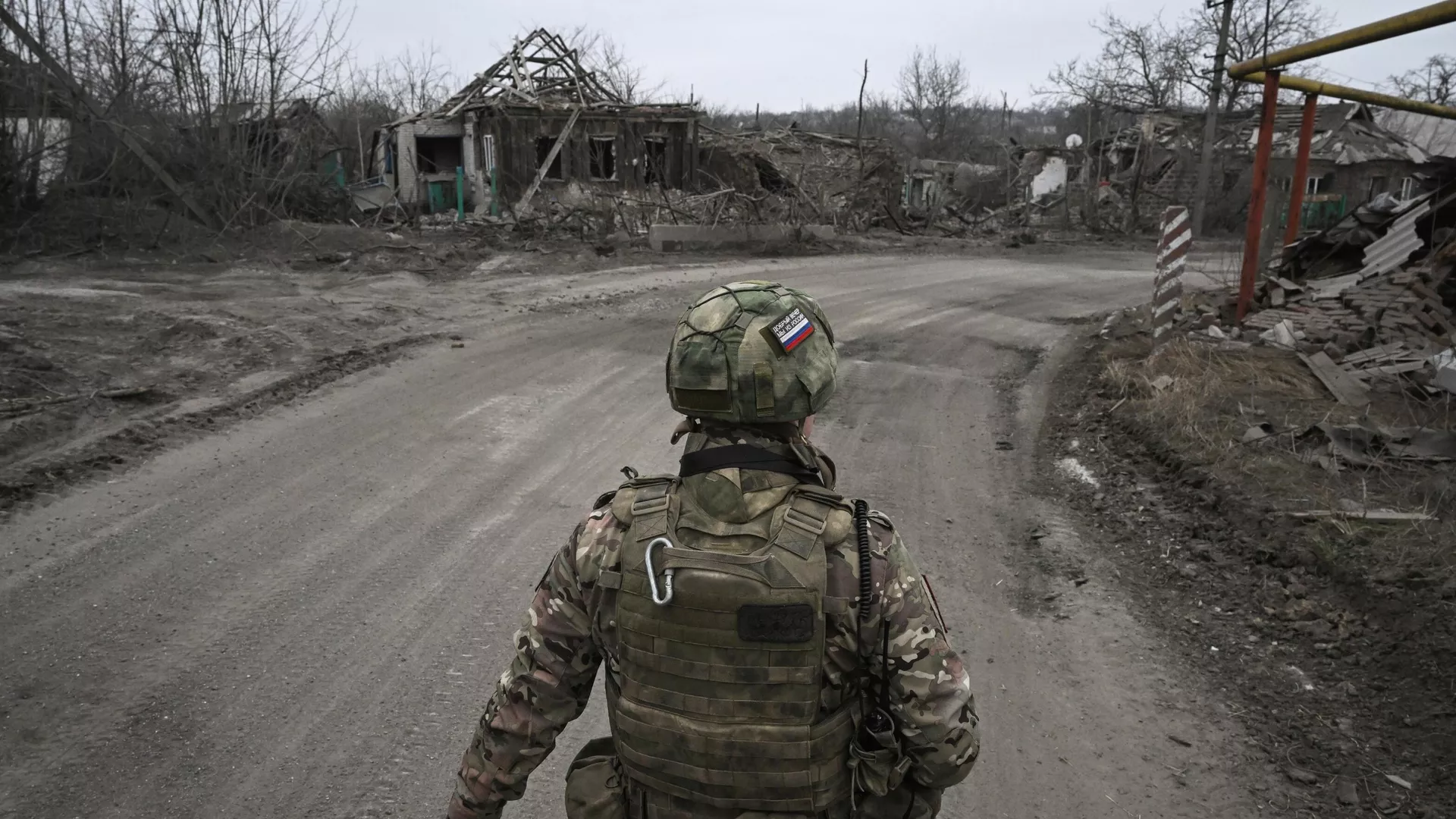 A sapper of the Centre group of forces inspects an area for explosive devices amid Russia's military operation in Ukraine, in the town of Avdeyevka near Donetsk, Donetsk People's Republic, Russia.