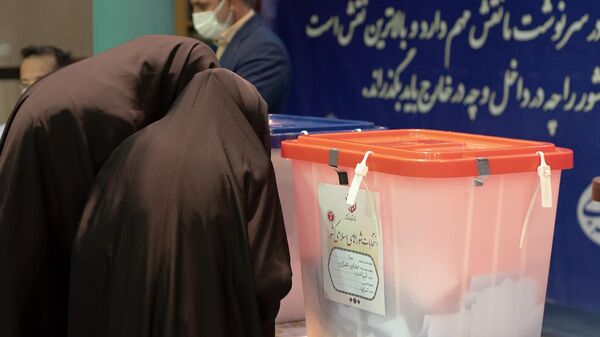 Women cast their ballots at a polling station during the presidential election, at the Hosseiniyeh Jamaran Mosque, in Tehran, Iran.  - Sputnik India