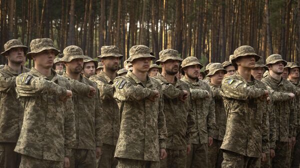Newly recruited soldiers of Ukraine's 3rd Assault Brigade shout slogans at a military base close to Kiev, Ukraine - Sputnik भारत