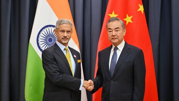 Indian Minister of External Affairs S. Jaishankar and Chinese Foreign Minister Wang Yi - Sputnik भारत