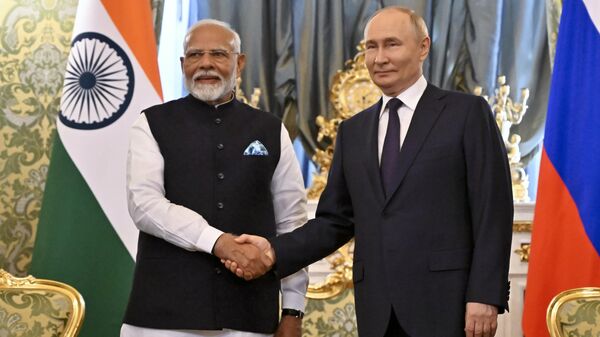 Russian President Vladimir Putin and Indian Prime Minister Narendra Modi shake hands during a meeting at the Kremlin in Moscow, Russia, Tuesday, July 9, 2024.  - Sputnik India