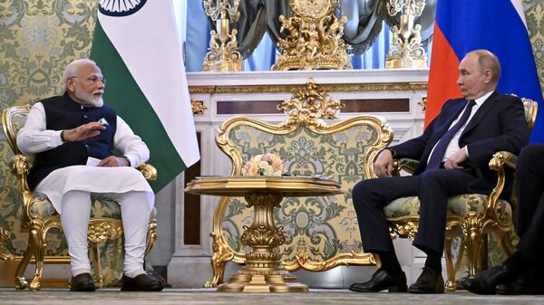 Russian President Vladimir Putin meets with Indian Prime Minister Narendra Modi at the Kremlin in Moscow, Russia, Tuesday, July 9, 2024. (Alexander Nemenov/Pool Photo) - Sputnik भारत