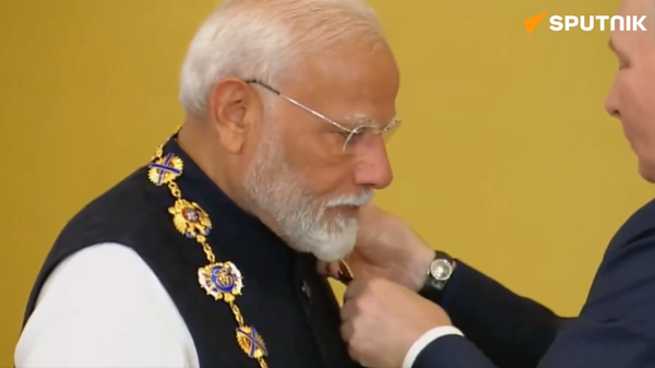 PM Modi honoured with Russia's highest civilian honour Order of St Andrew the Apostle. - Sputnik भारत