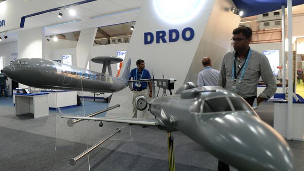Visitors look at a display of India's Defence Research and Development Organization (DRDO) communication aircraft at the DefExpo 2018, a large defence exhibition showcasing military equipment, on the outskirts of Chennai on April 11, 2018. - Sputnik भारत