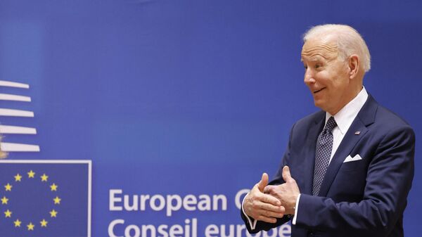 US President Joe Biden reacts at the start of the European Union (EU) summit at the EU Headquarters, one day to the month of Russia's invasion of the Ukraine, in Brussels on March 24, 2022. - Sputnik India