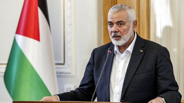 Ismail Haniyeh, the Doha-based political bureau chief of the Palestinian Islamist movement Hamas, speaks to the press after a meeting with the Iranian foreign minister in Tehran on March 26, 2024. - Sputnik India