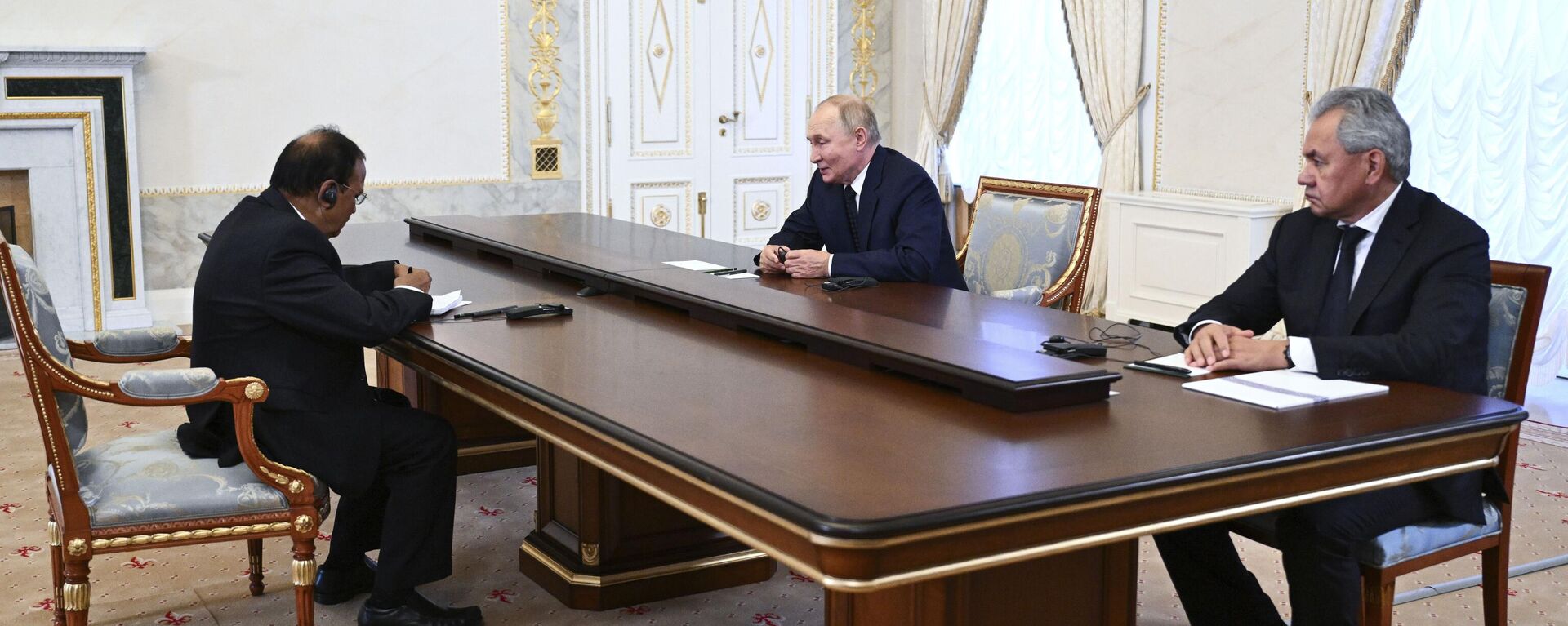 Russian President Vladimir Putin, center, accompanied by Russian Security Council Secretary Sergei Shoigu, right, speaks with Indian National Security Adviser Ajit Doval, left, on the sidelines of the BRICS and BRICS Plus High-Level Security Officials meeting in St. Petersburg, Russia, Thursday, Sept. 12, 2024. - Sputnik भारत, 1920, 12.09.2024