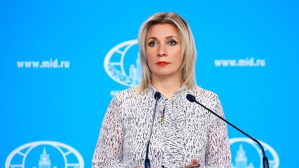 In this handout photo released by the Russian Foreign Ministry, Russian Foreign Ministry’s spokeswoman Maria Zakharova attends her weekly briefing in Moscow, Russia - Sputnik India