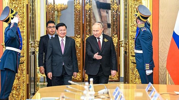 Russian President Vladimir Putin and President of the Lao People’s Democratic Republic Thongloun Sisoulith - Sputnik India