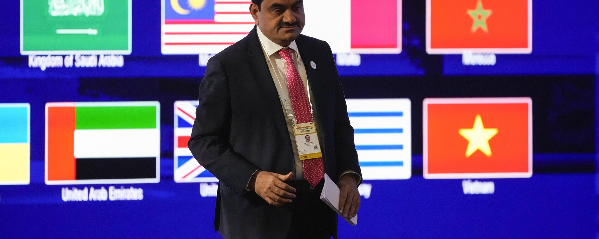 India's Adani Group Chairman Gautam Adani leaves after addressing the Vibrant Gujarat Global Summit, a business event to attract investments to the Gujarat state, in Gandhinagar, India, Wednesday, Jan.10, 2024. - Sputnik India, 1920, 16.09.2024