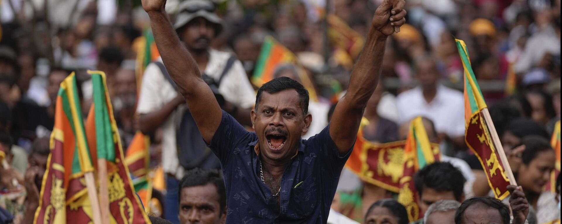 A supporter of Sri Lanka's president Ranil Wickremesinghe cheers during a public rally in Colombo, Sri Lanka, Wednesday, Aug. 28, 2024. - Sputnik India, 1920, 21.09.2024