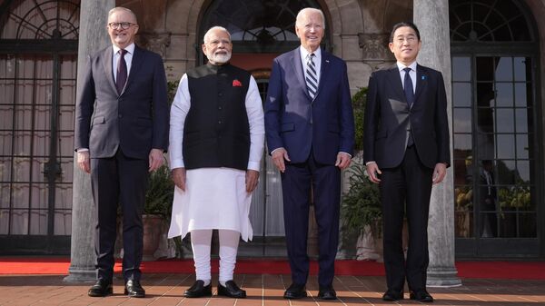 President Joe Biden greets from left, Australia's Prime Minister Anthony Albanese, India's Prime Minister Narendra Modi, Biden, and Japan's Prime Minister Fumio Kishida, at the Quad leaders summit at Archmere Academy in Claymont, Del., Saturday, Sept. 21, 2024. - Sputnik भारत