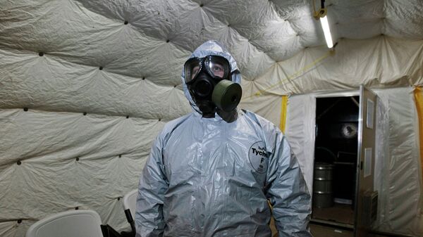 A chemical protection suit - Sputnik भारत