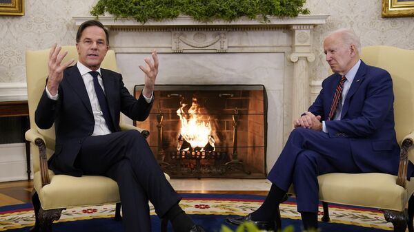 FILE - President Joe Biden meets with Dutch Prime Minister Mark Rutte in the Oval Office of the White House in Washington, Tuesday, Jan. 17, 2023. Over the course of more than a dozen years at the top of Dutch politics, Mark Rutte got to know a thing or two about finding consensus among fractious coalition partners. Now he's going to bring the experience of leading four Dutch multiparty governments to the international stage as NATO's new secretary general. (AP Photo/Carolyn Kaster, File) - Sputnik India