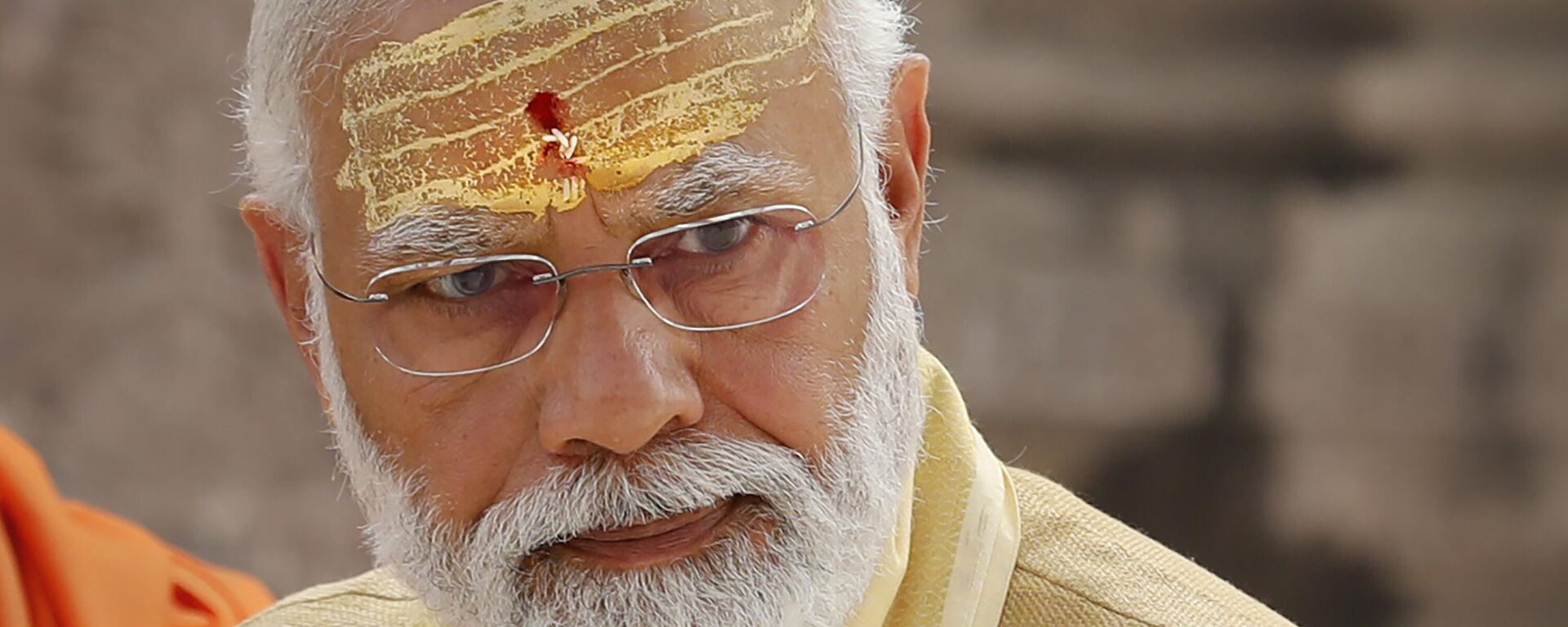 FILE- Indian Prime Minister Narendra Modi during the inauguration of Kashi Vishwanath Dham Corridor, a promenade that connects the sacred Ganges River with the centuries-old temple dedicated to Lord Shiva in Varanasi, India, Monday, Dec. 13, 2021. Popular but polarizing Prime Minister Narendra Modi who has advanced Hindu nationalism in India is returning for a third consecutive term in office after clinching victory in a general election that was seen as a referendum on his decade in power. (AP Photo/Rajesh Kumar Singh,file) - Sputnik भारत, 1920, 21.11.2024