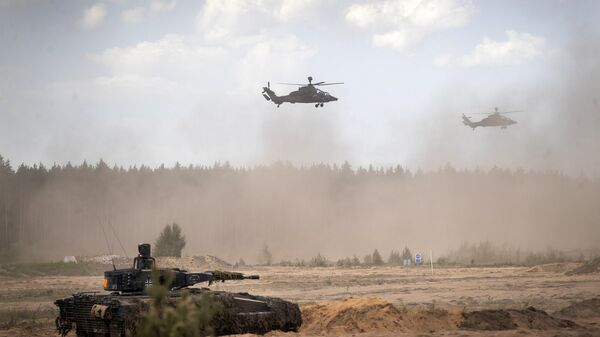 Eurocopters Tiger of the German Army take part in the Lithuanian-German division-level international military exercise 'Grand Quadriga 2024' at a training range in Pabrade, north of the capital Vilnius, Lithuania on May 29, 2024. - Sputnik भारत