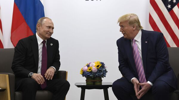  In this June 28, 2019, file photo, President Donald Trump, right, meets with Russian President Vladimir Putin during a bilateral meeting on the sidelines of the G-20 summit in Osaka, Japan. - Sputnik भारत