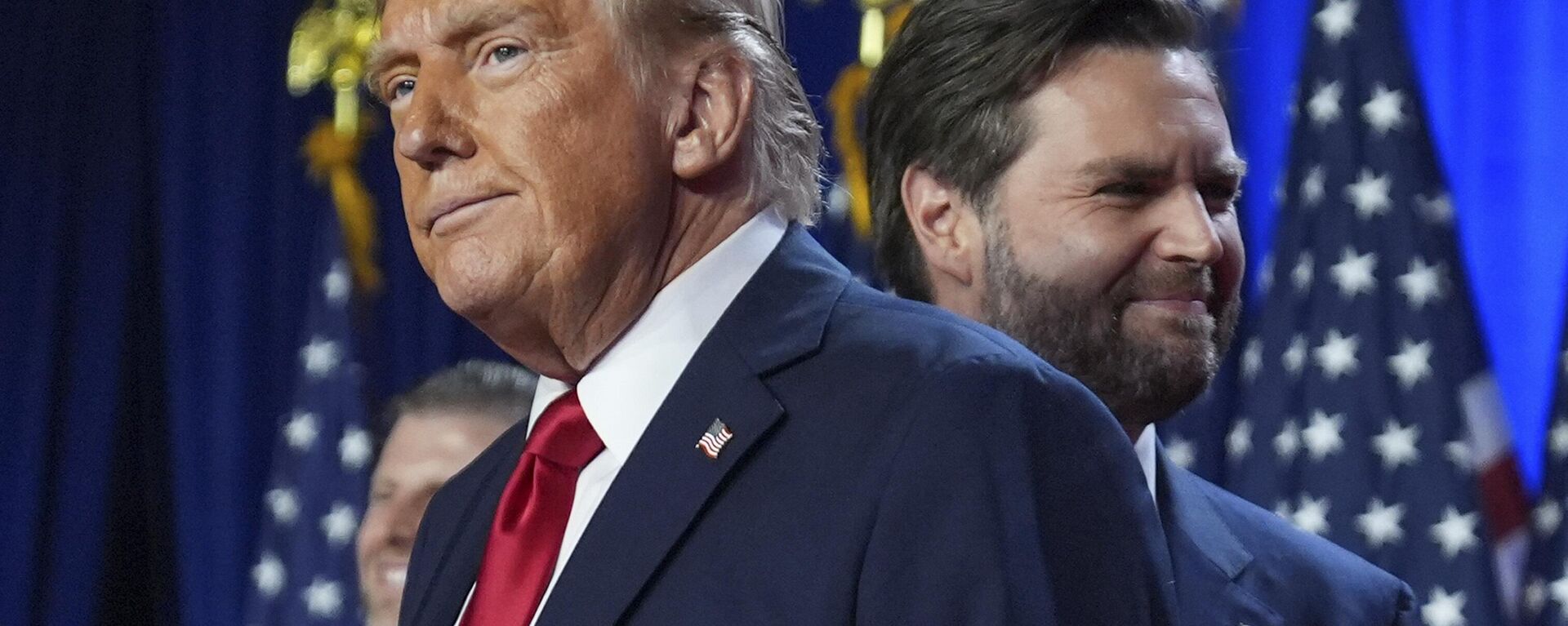 Republican President-Elect Donald Trump and his running mate, Senator JD Vance,  stand on stage at an election night watch party at the Palm Beach Convention Center, Wednesday, Nov. 6, 2024, in West Palm Beach, Florida. - Sputnik भारत, 1920, 26.11.2024