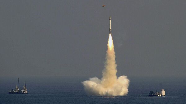 In this Sunday, Jan. 27, 2013 photo, India’s ballistic missile, with a range of 700 kilometers (435 miles), is launched in the waters off the Visakhapatnam coast, India.  - Sputnik भारत