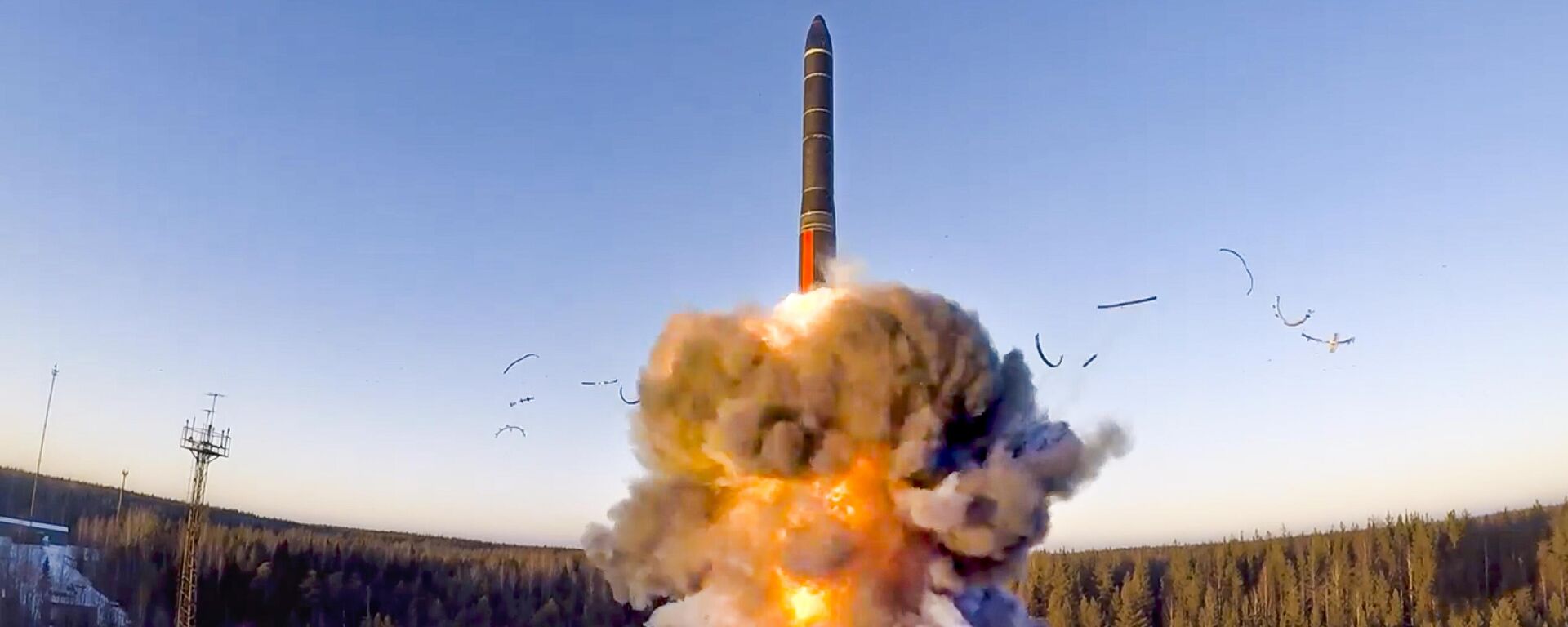 In this file photo taken from a video distributed by Russian Defense Ministry Press Service, on Wednesday, Dec. 9, 2020, a rocket launches from missile system as part of a ground-based intercontinental ballistic missile test launched from the Plesetsk facility in northwestern Russia - Sputnik India, 1920, 19.05.2026
