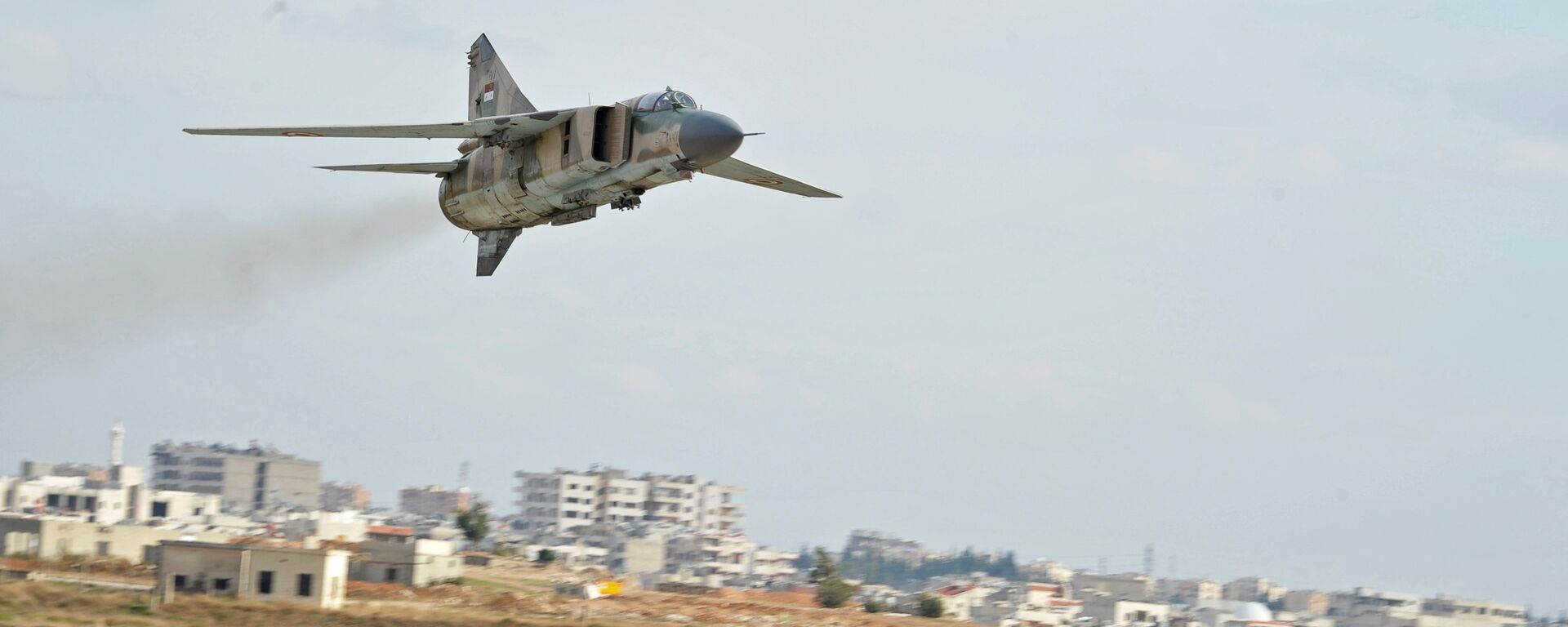 A MiG-23 aircraft of the Syrian Air Force lands at the Hama airbase near the city of Hama, Syria's Hama Province - Sputnik भारत, 1920, 01.12.2024