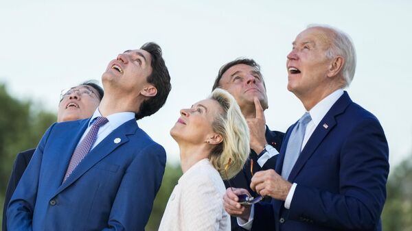 From right, U.S. President Joe Biden, French President Emmanuel Macron, European Commission President Ursula von der Leyen, Canada's Prime Minister Justin Trudeau and Japan's Prime Minister Fumio Kishida watch a skydiving demo during the G7 world leaders summit at Borgo Egnazia, Italy, Thursday, June 13, 2024. (AP Photo/Domenico Stinellis) - Sputnik India