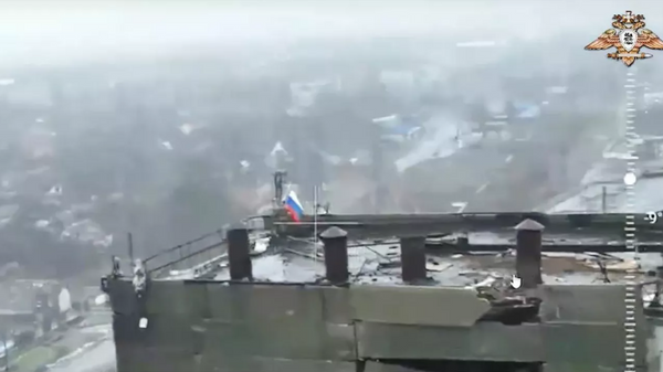 Russian flag in Kurakhovo - Sputnik India