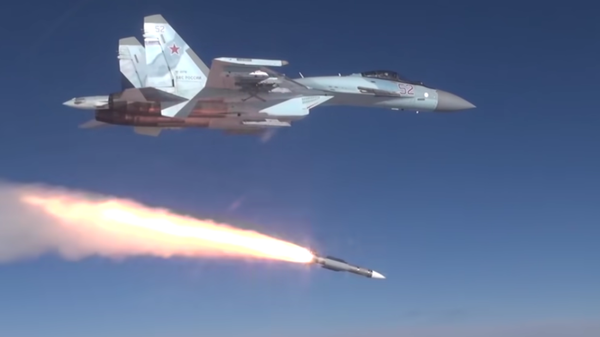 A Russian Su-35S fighter jet fires what appears to be an R-37M ultra-long-range air-to-air missile in a promotional video by the Russian Ministry of Defense - Sputnik भारत