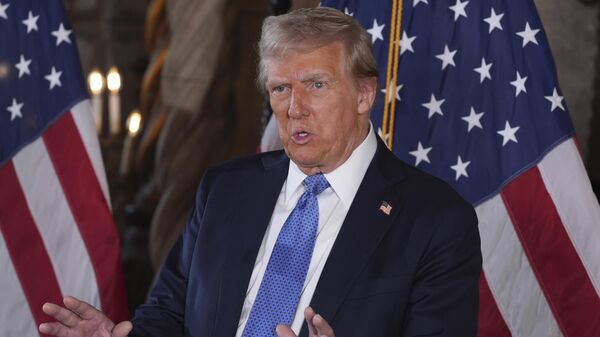 President-elect Donald Trump speaks during a news conference at Mar-a-Lago, Monday, Dec. 16, 2024. - Sputnik India