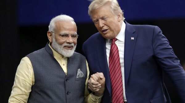 President Donald Trump shakes hands with Indian Prime Minister Narendra Modi during the Howdy Modi: Shared Dreams, Bright Futures event at NRG Stadium, Sunday, Sept. 22, 2019, in Houston - Sputnik India