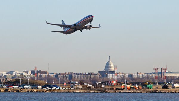 An American Airlines jet takes off from Reagan National Airport in Washington - Sputnik भारत